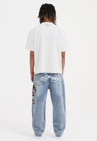 Ed Hardy SKULL SNAKE EAGLE TATTOO GRAPHIC - Jeansy Relaxed Fit