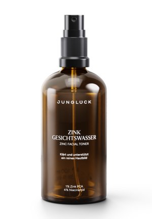 Braune Glas-Sprühflasche mit der Aufschrift "Jungluck Zinc Facial Toner" mit Zink PCA und Niacinamid, unterstützt klare Haut.