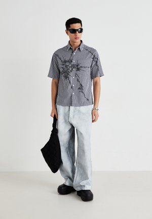 Κατάταξη 8: Jaded London - OVER PAINTED COLOSSUS - Τζιν χαλαρής εφαρμογής