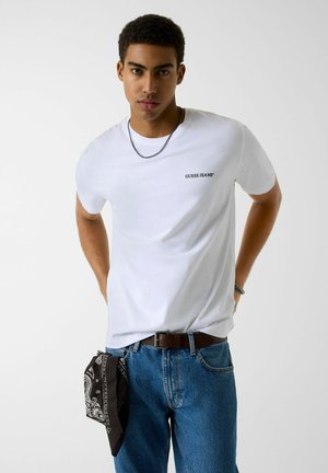Guess, GJ SS CN REG UNISEX LOGO PRINT - T-shirt con stampa - g pure white