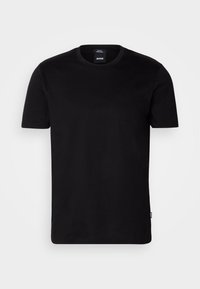 T-shirt noir slim-fit à manches courtes, col rond et petite étiquette de marque visible sur le col et la couture latérale.