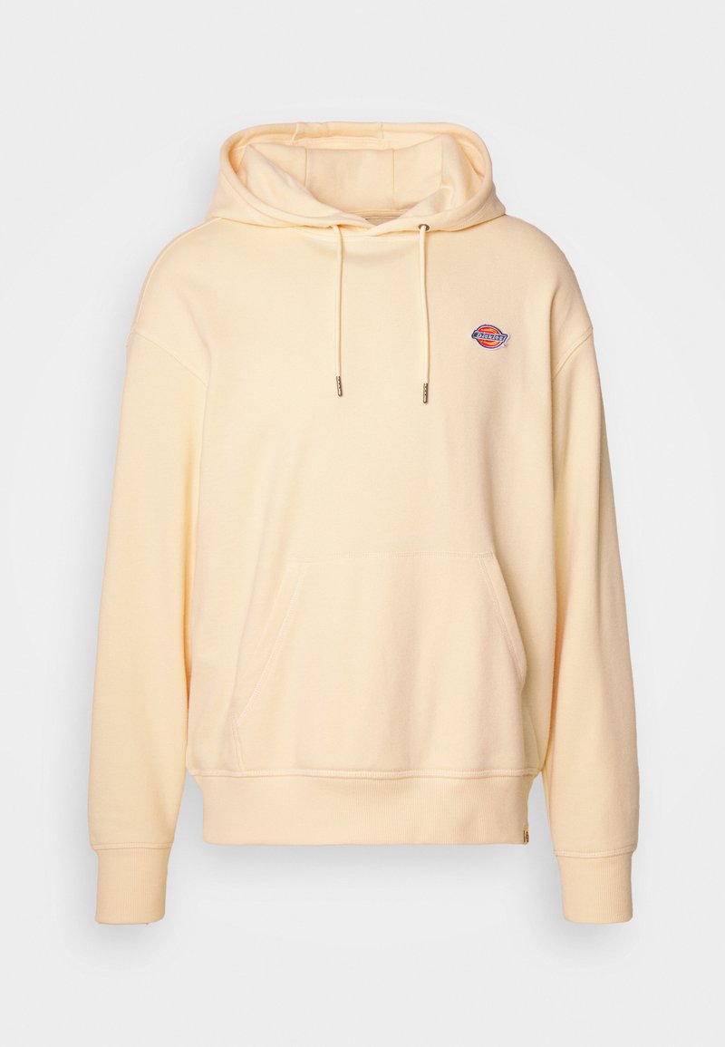 Hoodie en coton jaune clair avec une poche frontale, capuche à cordon de serrage et logo brodé sur la poitrine. Présente des poignets et un ourlet côtelés.