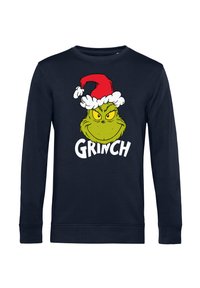 Námořnický dlouhý rukáv mikina s grafikou Grinche v červené vánoční čepici a textem "GRINCH" napsaným bílým písmem pod obrázkem.