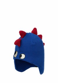 Blue knitted hat with red spiky accents, oversized eyes on front, and ear flaps. Made of ribbed fabric, featuring a playful design.