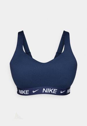 Marineblaue Sport-BH mit glatter Textur, breiten Trägern und einem elastischen Band mit Markenaufdruck in weißer Schrift. Nahtloses Design ohne Polsterung.