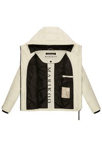 Puffer jacket in cream with a black interior. Features a hood, zipper closure, and logo detailing. Includes an interior pocket with a label.