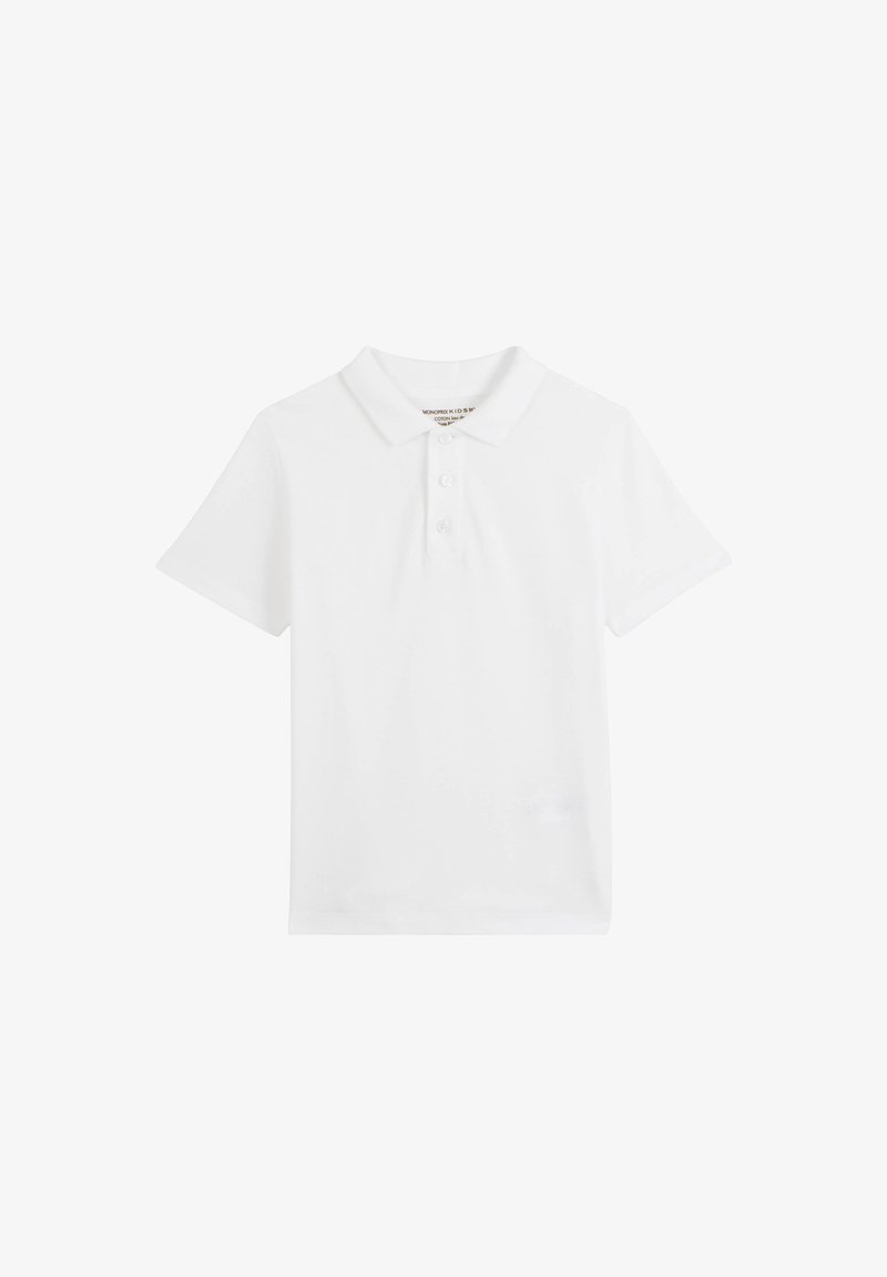 Chemise polo blanche en coton, dotée d'un col classique, de manches courtes et d'une patte de boutonnage à trois boutons. Texture lisse, design simple.
