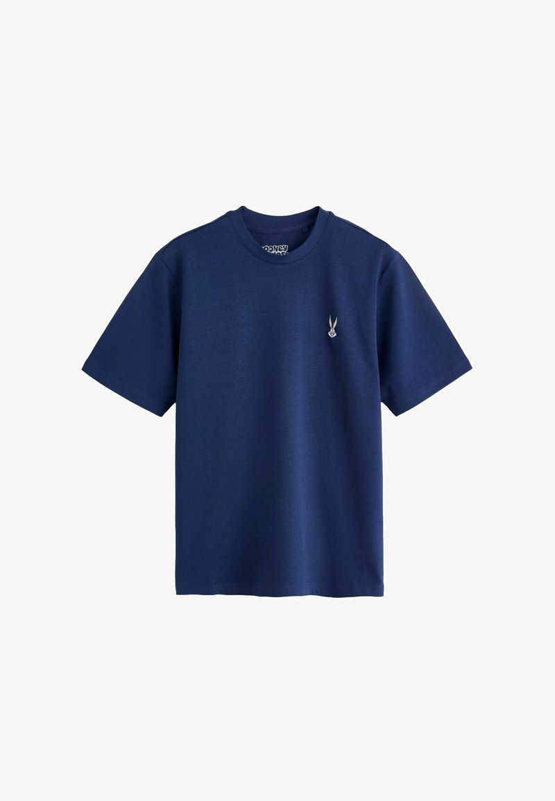 T-shirt bleu marine à manches courtes avec col rond, avec un petit visage de Bugs Bunny brodé sur la poitrine gauche.