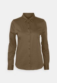 Camicia marrone con bottoni, colletto, maniche lunghe e tessuto testurizzato. Dettagli notevoli includono accenti sulle spalle e bottoni abbinati.