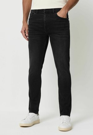 Liibuvad teksad - washed black