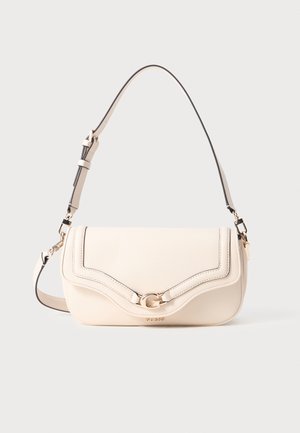 Beige handbag with curved top seam, gold hardware, and adjustable strap. Smooth leather texture, featuring subtle logo accent on front.