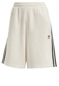 Krämfärgade ribbade shorts med resårmidja, med tre svarta sidostråk och en liten svart Adidas-logga vid fållen.