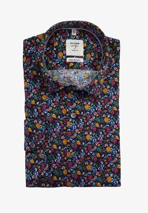 Chemise à motif floral avec fond sombre, présentant des fleurs colorées en jaune, rose, bleu et vert. Fermeture à boutons, coupe ajustée.