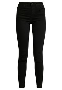 Vaqueros ajustados negros de mezclilla, con talle alto, bolsillos delanteros y cierre de cremallera con botón. Textura suave y elástica.