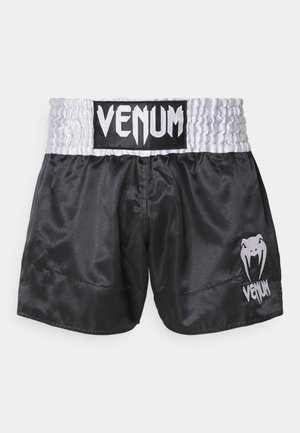 Črne satenske boksarske hlače z belim elastičnim pasom. Imajo izstopajoč črno-beli logo "VENUM" in grafiko pajka.