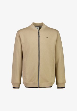 Beige jack met ritssluiting, gemaakt van zachte stof, met een staande kraag, zijzakken, geribbelde manchetten en een contrasterende marineblauwe accent aan de onderkant.