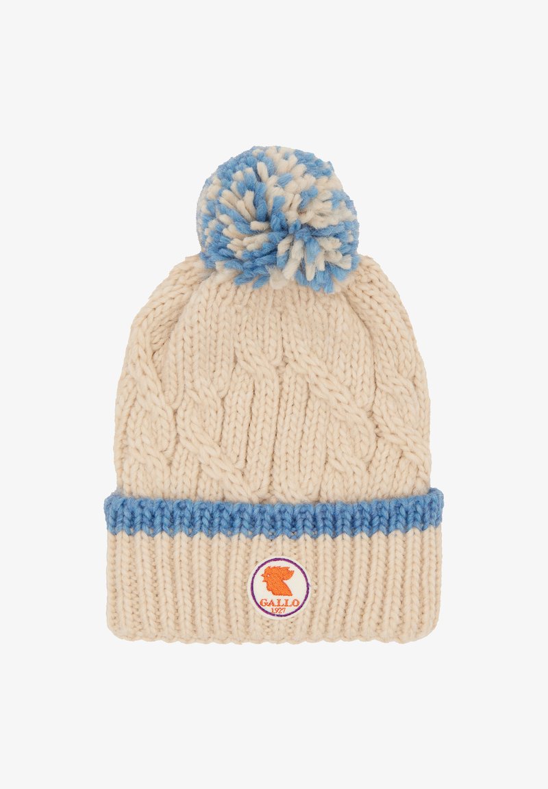 Knitted cream beanie with a blue ribbed cuff and pom-pom. Features a logo patch at the front. Cable knit pattern throughout.