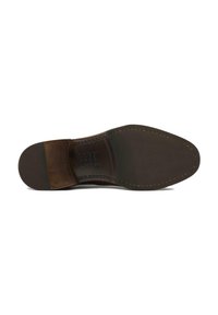 Leather shoe sole featuring a brown finish, textured upper surface, and contrasting dark heel cap with stitching and embossed details.