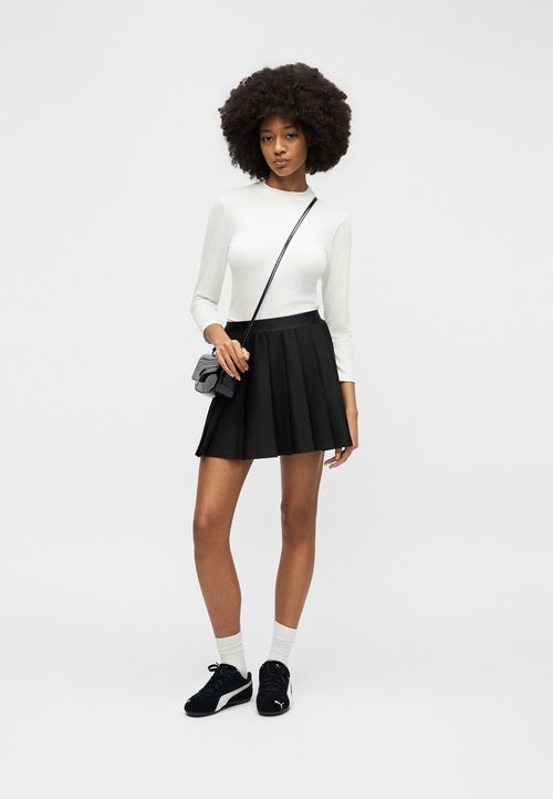 PUMA WARDROBE - Pleated skirt - black — photo 5