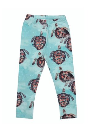 Hellblaue Leggings mit einem sich wiederholenden Muster detaillierter Meeresschildkröten in Braun- und Orangetönen, die über den Stoff schwimmen.