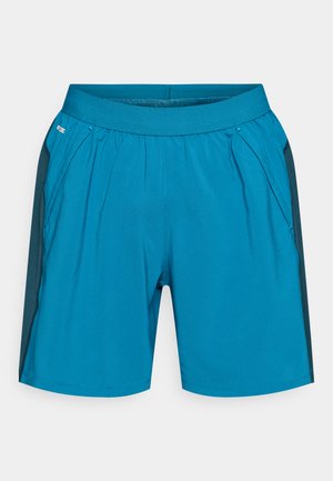 Turkise træningsshorts med elastisk taljebånd, sidelommer og mørkegrønne detaljer langs siderne. Fremstillet af letvægtsstof.