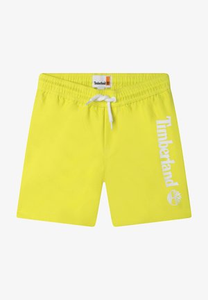 Shorts de bain jaunes fluo avec une taille élastique et un cordon blanc. Dotés du logo et de l'emblème "Timberland" sur le côté gauche.