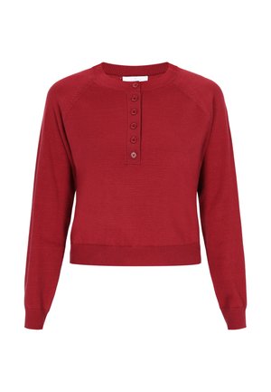 Červený zkrácený svetr s kulatým výstřihem, zapínáním na pět knoflíků a dlouhými rukávy raglánového střihu. Měkký pletený materiál s žebrovan ými manžetami a lemem.