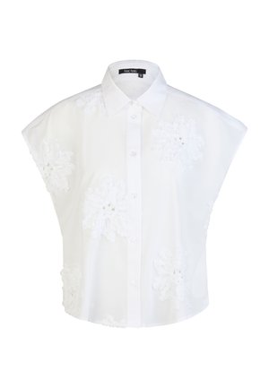 White short-sleeve button-up blouse with collar and large floral embroidery designs on front and sleeves.