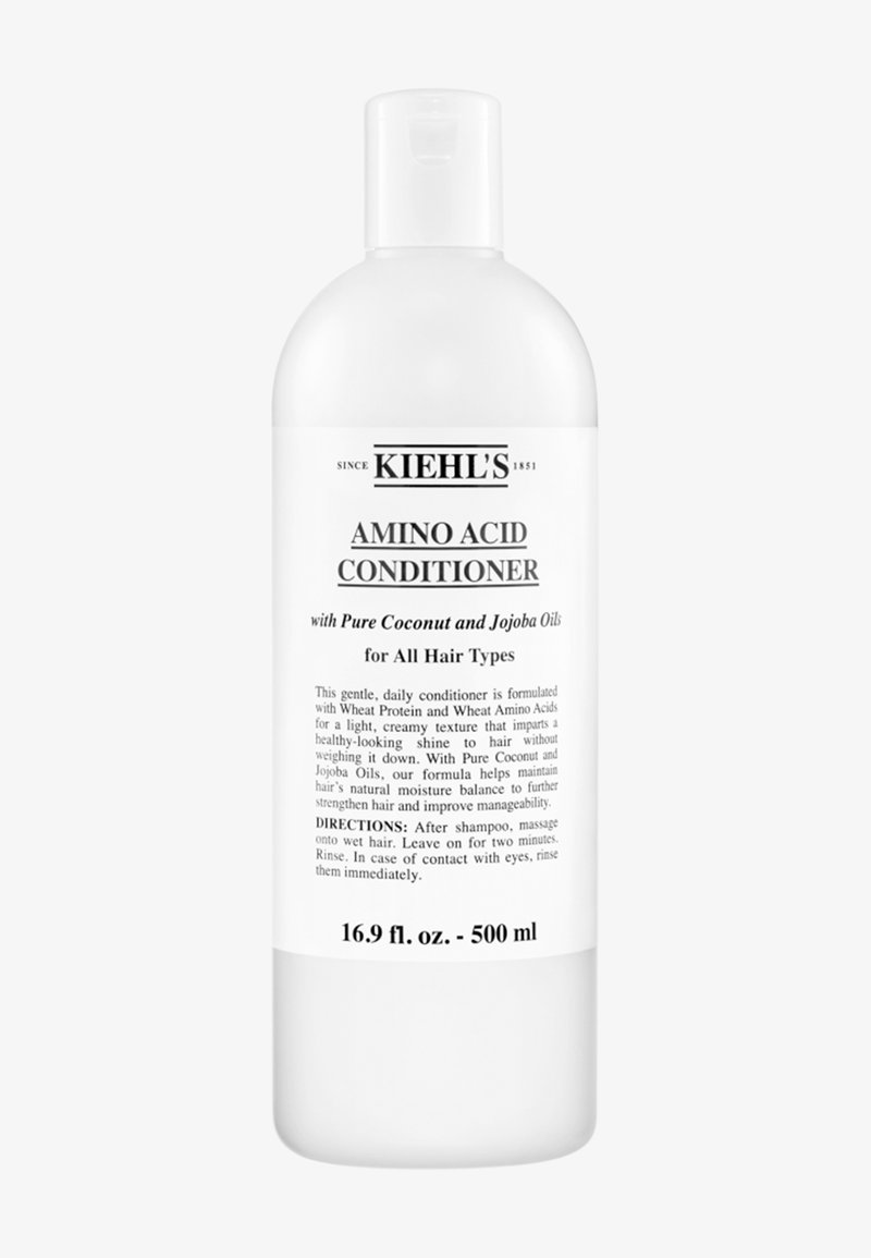 Hvit plastflaske med pumpeåpning, merket "Kiehl's Amino Acid Conditioner," med svart tekst og størrelseindikator på 16,9 fl. oz. (500 ml).