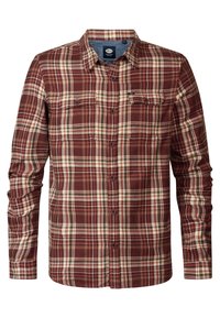 Camisa de cuadros en rojo y beige, confeccionada en una tela suave, con un cierre frontal de botones, dos bolsillos en el pecho y puños con botón. Diseño de corte regular.