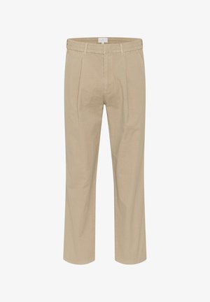 Bež hlače s plisiranjem, izdelane iz teksturirane tkanine, z sproščenim krojem in elastičnim pasom, zasnovane brez žepov.