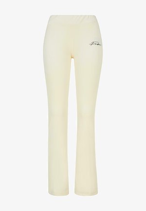 Cream-colored flared pants with an elastic waistband, featuring a small black "Febu" logo on the left thigh. Smooth, stretchy fabric.