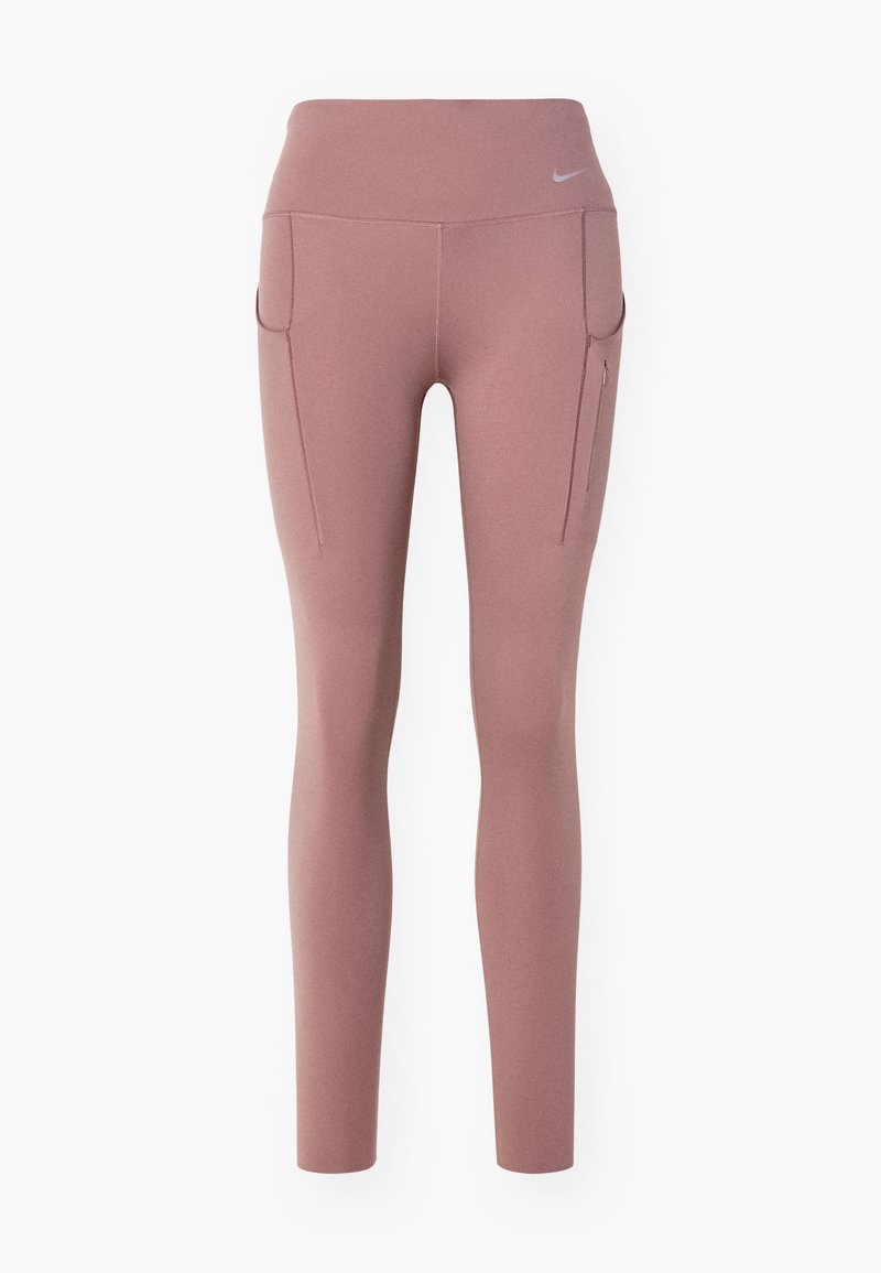 Leggings de talle alto en color malva con bolsillos laterales, uno con cremallera, y un pequeño logo de Nike en la parte izquierda de la cadera.