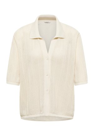 Cardigan crem cu mâneci scurte, tricotat, cu guler, închidere cu nasturi în față și model țesut în zigzag.