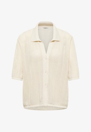 Trumpomis rankovėmis smėlio spalvos megztinis kardiganas su apykakle, priekyje sagutėmis ir tekstūruotu zigzago raštu.