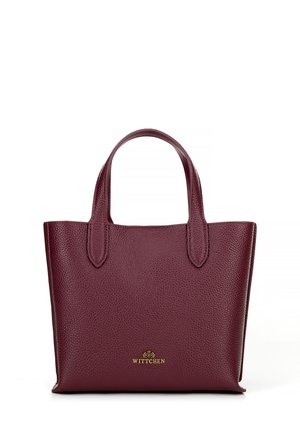 Maroon leather tote bag with textured surface, short handles, and a gold logo on the front. Compact, rectangular shape.