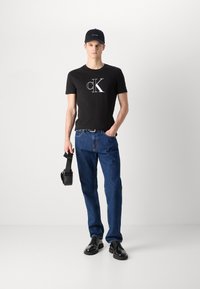 Calvin Klein Jeans OUTLINE MONOLOGO TEE - T-shirts print - black
