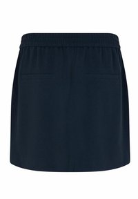 Jupe bleu marine avec taille élastique, deux poches avant et un tissu lisse, légèrement texturé. Forme en A, design à mi-cuisses.