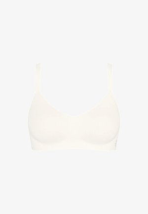 Sømløs trådløs blød skål-bh i elfenben med tynde, justerbare stropper og uden bøjle for komfort og let støtte.