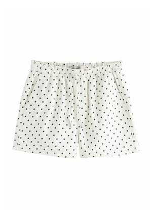 Białe szorty z elastycznym pasem, czarne kropki i boczne kieszenie, z przednim troczkiem.