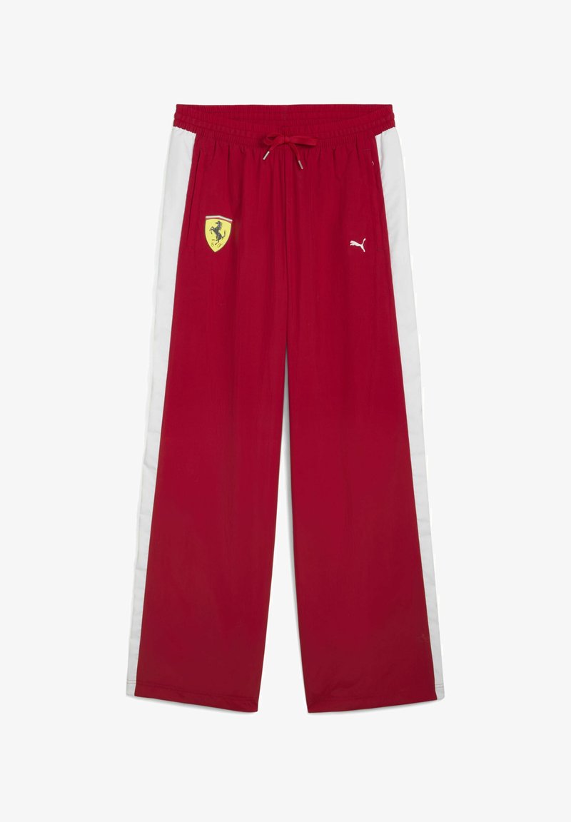 Sarkan sporta bikses ar baltām sānu svītrām. Iespējojusi dzeltenā Ferrari logo un baltā Puma logo. Elastīgs jostasvīrs ar auklu.