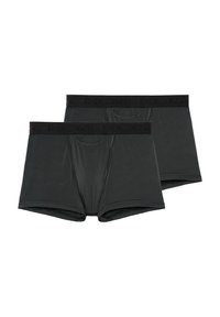 Boxer briefs a righe nere con una fascia nera che presenta il nome del marchio. Tessuto morbido con una texture liscia e design aderente.