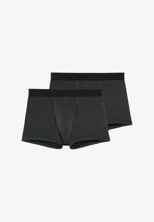 Sorte stribede boxershorts med en sort elastik, der har brandnavnet. Blødt stof med en glat tekstur og tætsiddende design.