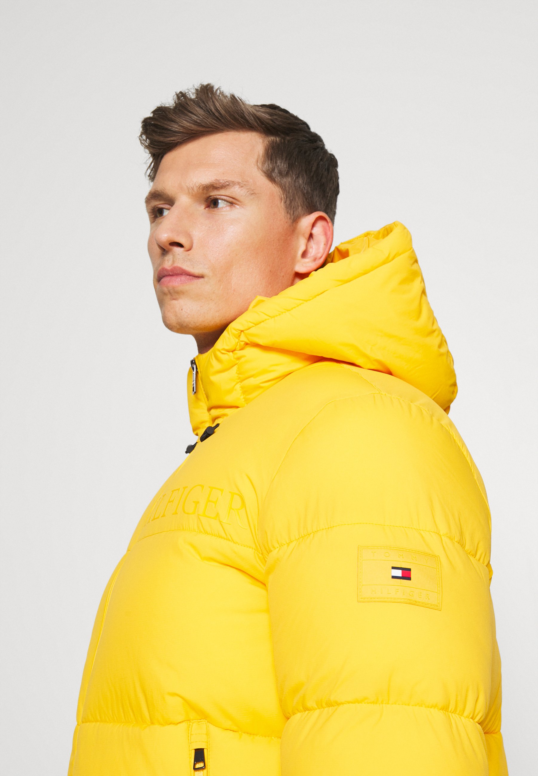 tommy yellow puffer