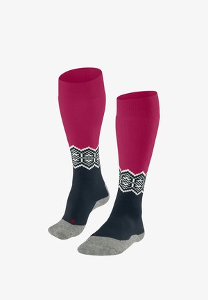 Calzini al ginocchio con una sezione superiore fucsia, un corpo inferiore blu scuro e un motivo geometrico bianco. Accenti grigi sulla punta e sul tallone.