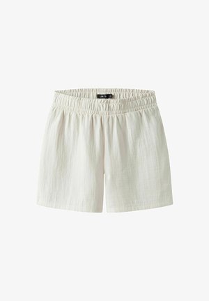 Kergedbeesigniga lühikesed püksid tekstuurse kangaga, milles on kogutud elastne vöökoht ja lõdvestatud, veidi lõtv sobivus.