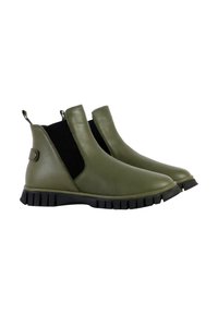 Botas de tobillo de cuero verde oliva con paneles laterales de elastano y suela de goma negra texturizada. Cuenta con tiradores para poner y quitar fácilmente.