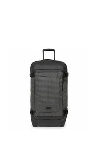 Mochila con ruedas en un diseño de cuadros en blanco y negro, hecha de un tejido duradero. Cuenta con un bolsillo frontal con cremallera y correas ajustables para un transporte seguro.