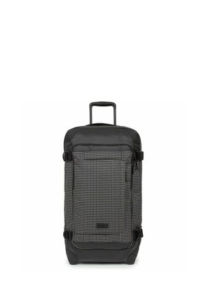 Black and white checkered wheeled backpack made of durable fabric. Features a zippered front pocket and adjustable straps for secure carrying.