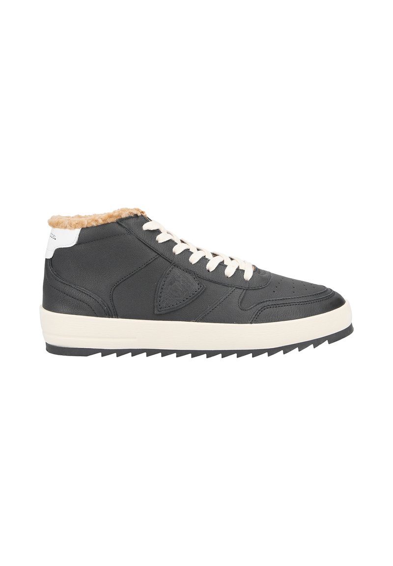 High-top sneakers made of black leather with a tan fur lining, white laces, and a cream-colored rubber sole with a serrated edge.